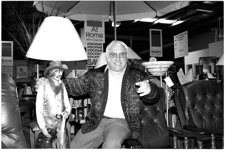 Frank Pierotti seated in the showroom