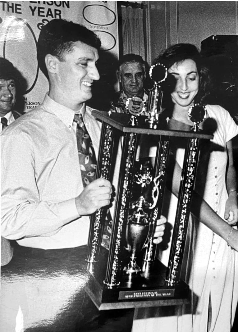 A young Paul Pierotti holding a trophy