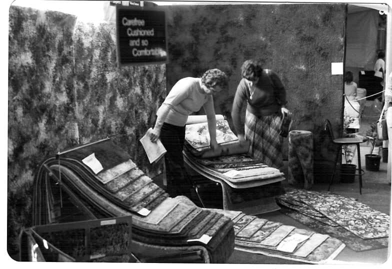 Customers browsing the range at a trade show