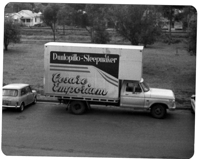 The signwritten Cesare Emporium delivery truck