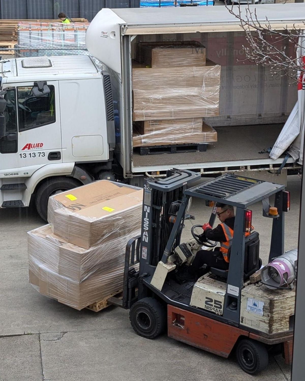 Our loading dock stacked with boxed mattresses ready for delivery